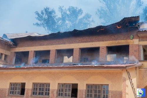 Flutist playing her instrument on stage